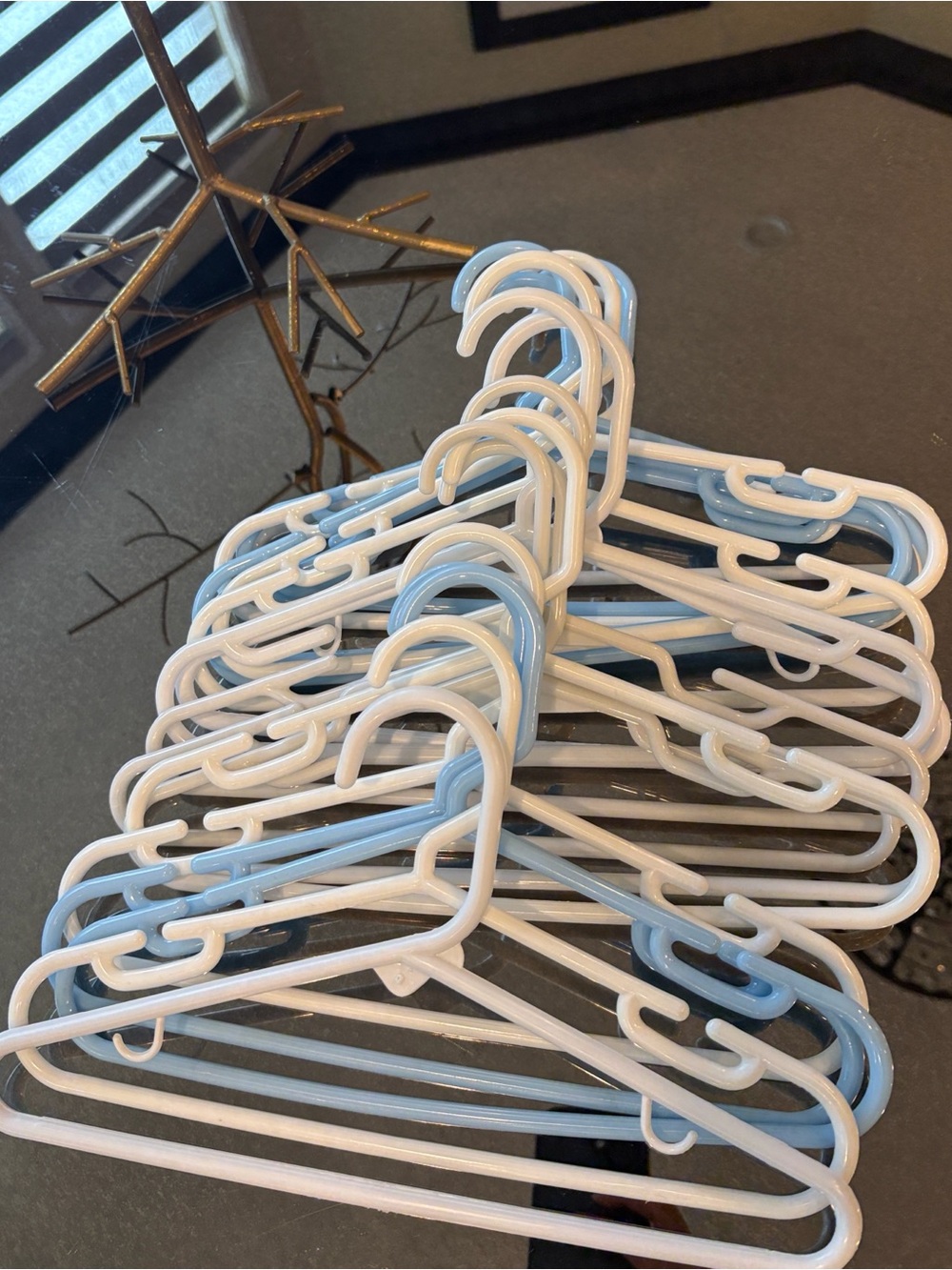 18 mixed White and Light Blue Plastic Hangers